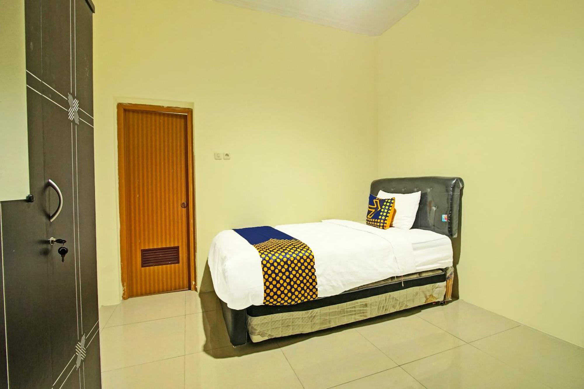 Spot On 91890 Kost Kalasan Syariah Malang